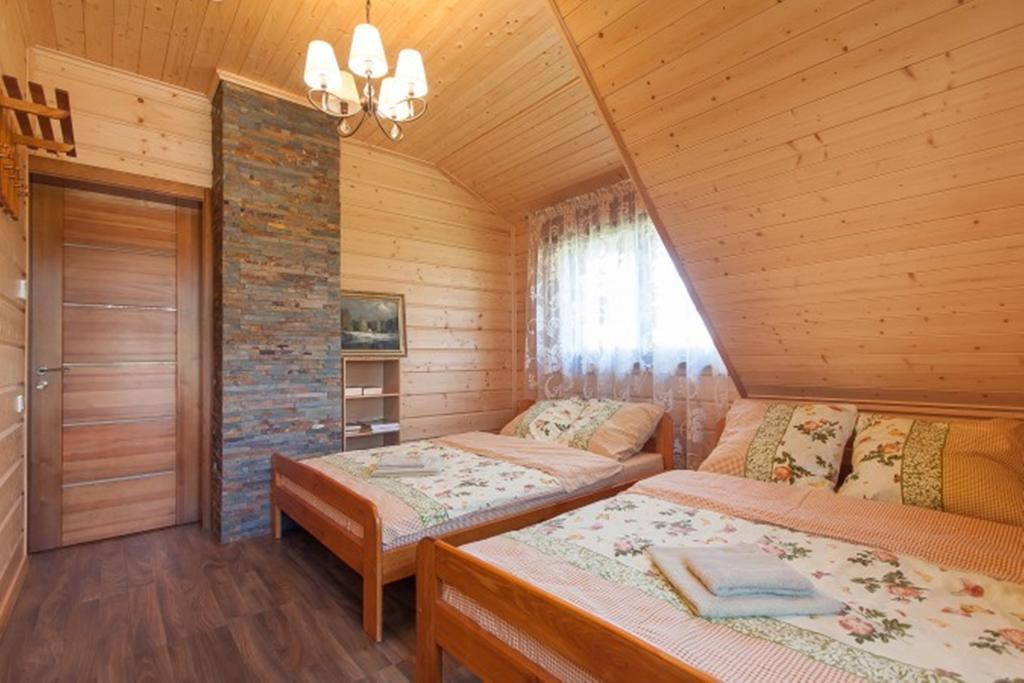 Vila Viesai Тракай Стая снимка